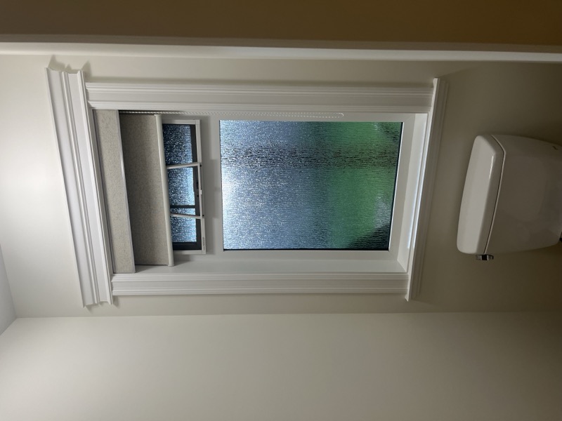 Interior painting — open room with warm gold walls and recessed lighting, Jubilee Heights Campbell River